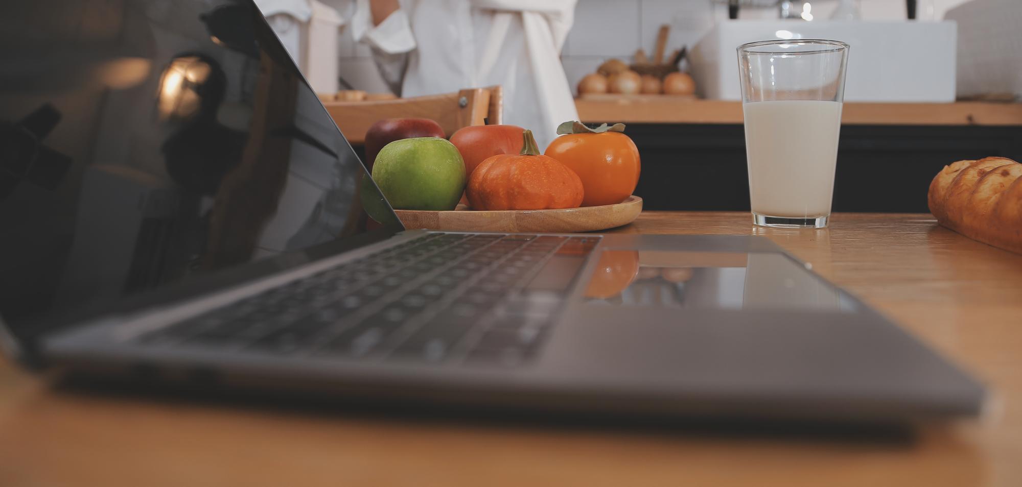 Small studio kitchen with tools and laptop